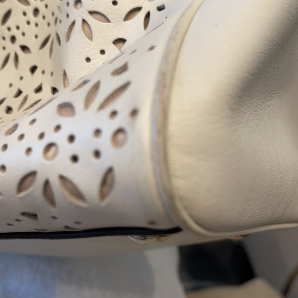 Coach Taylor Perforated Putty White Leather Satchel
12"L x 4.5"W x 8"H - Picture 10 of 11